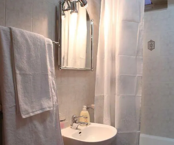 בית נופש Under The Clock Tower